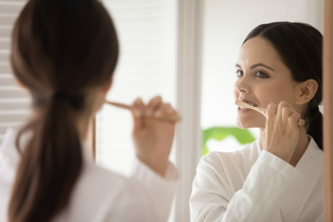 Woman Brushing Teeth