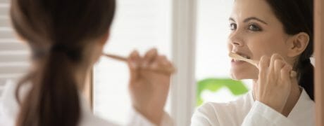 Woman Brushing Teeth